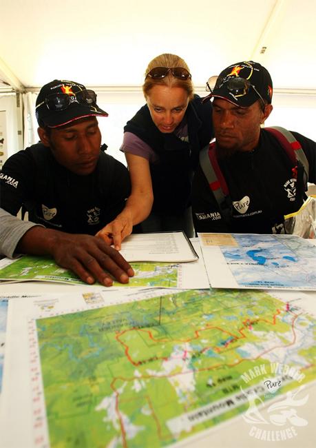 Javith Ababu (Right) and Gibson Kemori (Left) of team No Roads Expeditions look at thier course maps pre-event.